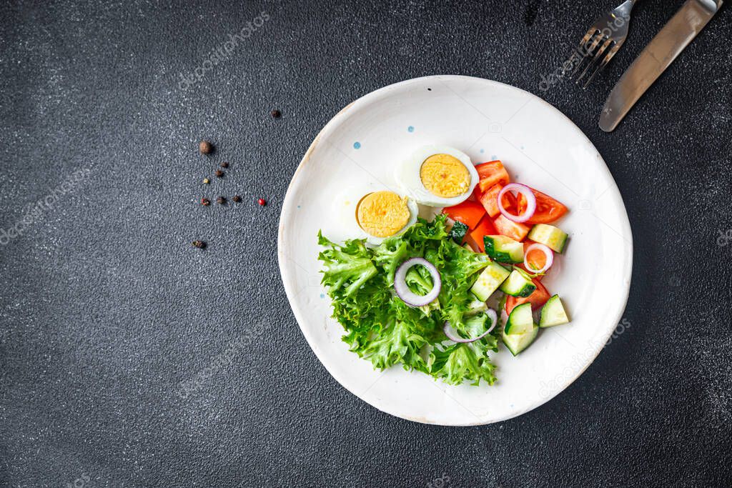 salad eggs, vegetable, cucumber, tomato, lettuce veggie healthy meal snack diet on the table copy space food background  keto or paleo diet vegetarian food no meat