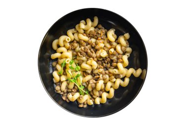 Mercimek makarna cavatappi fasülyesi ikinci tabakta sağlıklı beslenme diyeti atıştırmalığı fotokopi uzayı arka plan kırsalında. Keto ya da paleo diyeti vejetaryen ya da vejetaryen yemeği et yok.