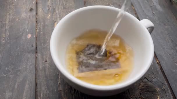 Cup Tea Table Pour Boiling Water Tea Bag Hot Drink — Vídeo de Stock