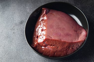 raw liver piece beef meat healthy meal food snack on the table copy space food background rustic halal kosher food