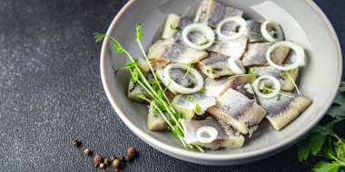 herring salted piece plate seafood fish meal food snack on the table copy space food background