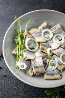 herring salted piece plate seafood fish meal food snack on the table copy space food background