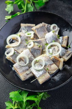 herring salted piece plate seafood fish meal food snack on the table copy space food background