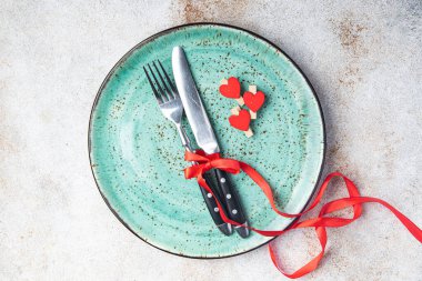 cutlery valentines day table setting fork, knife, plate valentine holiday decoration love valentine's date copy space food background