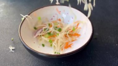 coleslow salad cabbage vegetable carrot, onion, greens healthy meal food snack on the table copy space food background rustic top view keto or paleo diet veggie vegan or vegetarian