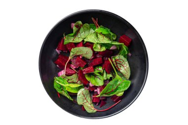 Pancar salatası karışımı yeşil pancar pancarı sebze taze sağlıklı beslenme diyeti aperatifi masanın üzerinde fotokopi uzayı arka planı kırsal üst görünüm keto veya paleo diyet vejetaryen veya vejetaryen yemeği bırakır.