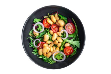 Salata fasulyesi, soğan, marul, taze beslenme diyeti aperatiflerini masanın üzerinde fotokopi arka planında keto veya paleo diyet vejetaryen veya vejetaryen yemeği ile karıştırın.