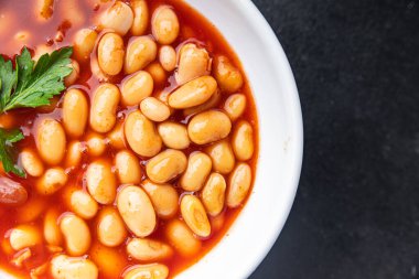 Fasulye sosu fasülye fasulyesi taze sağlıklı yemek abur cubur diyeti masada fotokopi uzayı yemek arka plan kırsal üst görüş keto veya paleo diyet vejetaryen veya vejetaryen yemeği et yok.