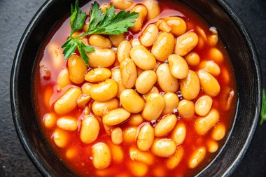 Fasulye sosu fasülye fasulyesi taze sağlıklı yemek abur cubur diyeti masada fotokopi uzayı yemek arka plan kırsal üst görüş keto veya paleo diyet vejetaryen veya vejetaryen yemeği et yok.