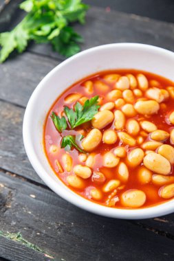 Fasulye sosu fasülye fasulyesi taze sağlıklı yemek abur cubur diyeti masada fotokopi uzayı yemek arka plan kırsal üst görüş keto veya paleo diyet vejetaryen veya vejetaryen yemeği et yok.