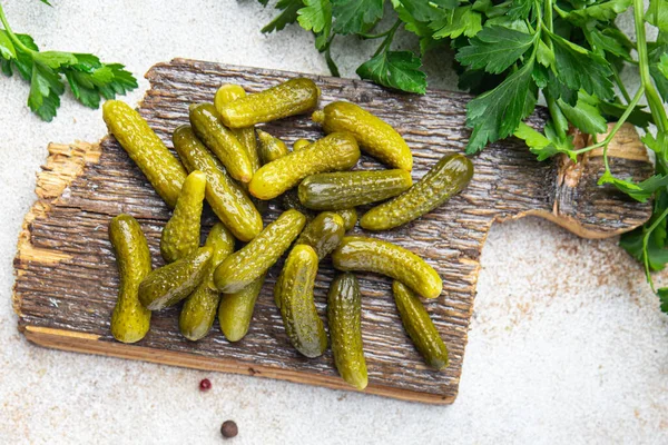 gherkins cucumber salted pickled vegetable food meal snack on the table copy space food background