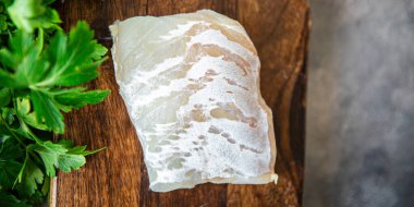 Morina balığı beyaz fileto taze yemek aperatifi masa üzerinde fotokopi uzay yiyecek arka plan kırsal üst görünüm 