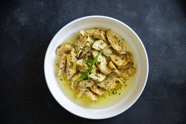 Enginar konservesi taze sağlıklı yemek yiyecekler fotokopi masasında yer alan uzay yiyecekleri arka plan kırsal üst görüş keto veya paleo diyet vejetaryen veya vejetaryen yiyecekler.