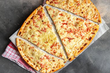 Flammkuchen pie bacon, onion, sour cream pastrie pie meal food snack on the table copy space food background
