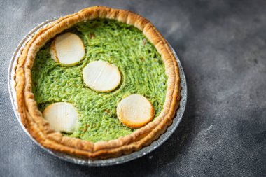 savory pie green spinach tart cheese fresh healthy meal food snack on the table copy space food background