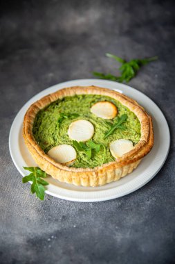 savory pie green spinach tart cheese fresh healthy meal food snack on the table copy space food background