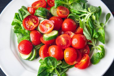 salad tomatoe cherry fresh healthy meal food snack on the table copy space food background