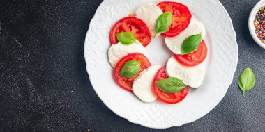 caprese salad mozzarella and basil tomato fresh meal food snack on the table copy space food background