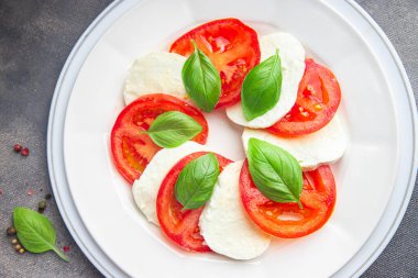 caprese salad mozzarella and basil tomato fresh meal food snack on the table copy space food background