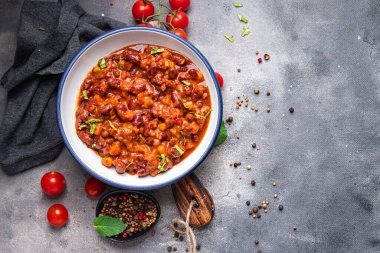 chili con carne beans, corn, meat, tomato healthy meal food snack on the table copy space food background rustic top view