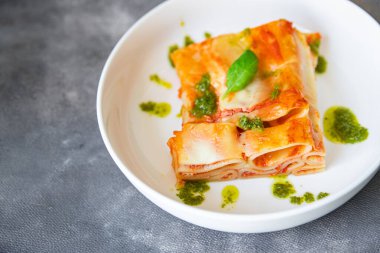 pasta casserole ziti lasagna tomato sauce, cheese fresh meal food snack on the table copy space food background
