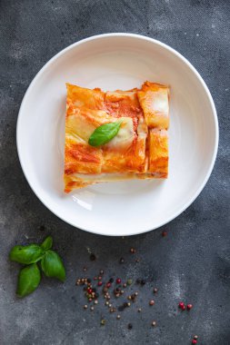 pasta casserole ziti lasagna tomato sauce, cheese fresh meal food snack on the table copy space food background
