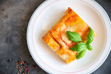 pasta casserole ziti lasagna tomato sauce, cheese fresh meal food snack on the table copy space food background