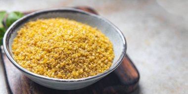 bulgur çiğ tahıl hasadı bitkisel gıda sağlıklı yemek abur cubur diyeti masa üzerinde fotokopi uzay yiyecek arka plan kırsal üst görüş keto veya paleo diyet vejetaryen veya vejetaryen gıda