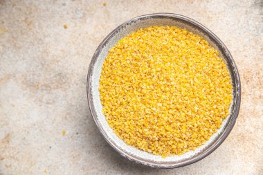 bulgur çiğ tahıl hasadı bitkisel gıda sağlıklı yemek abur cubur diyeti masa üzerinde fotokopi uzay yiyecek arka plan kırsal üst görüş keto veya paleo diyet vejetaryen veya vejetaryen gıda