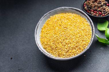 bulgur çiğ tahıl hasadı yiyecek sağlıklı yemek abur cubur diyeti masadaki fotokopi alanı yiyecek arka planında