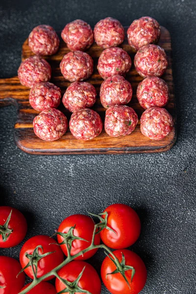 raw meat balls ground meat ground fresh pork, beef, lamb cooking healthy meal food snack diet on the table copy space food background rustic top view