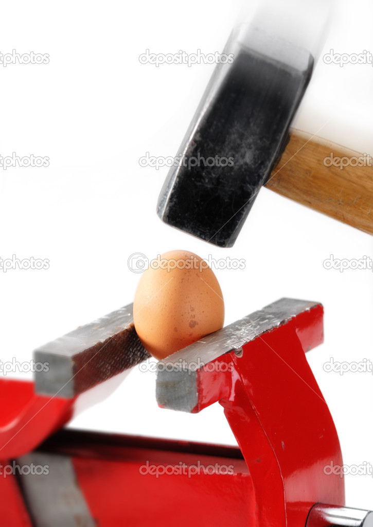 Egg, vise and hammer