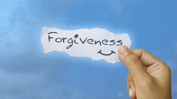 Uwaga komunikat przebaczenie — Zdjęcie stockowe