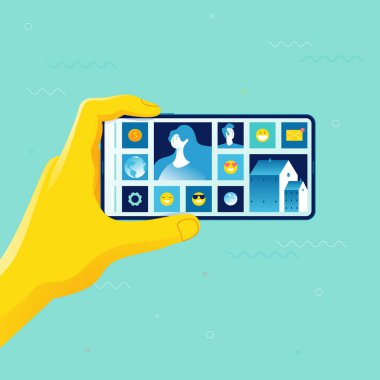 Eller akıllı telefonu tutuyor.