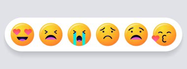 Emoji gülen yüz ile karşı karşıya.