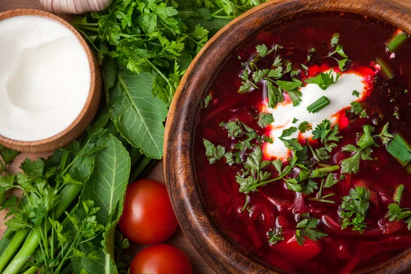 Borsch in a wooden plate — Stock Photo, Image