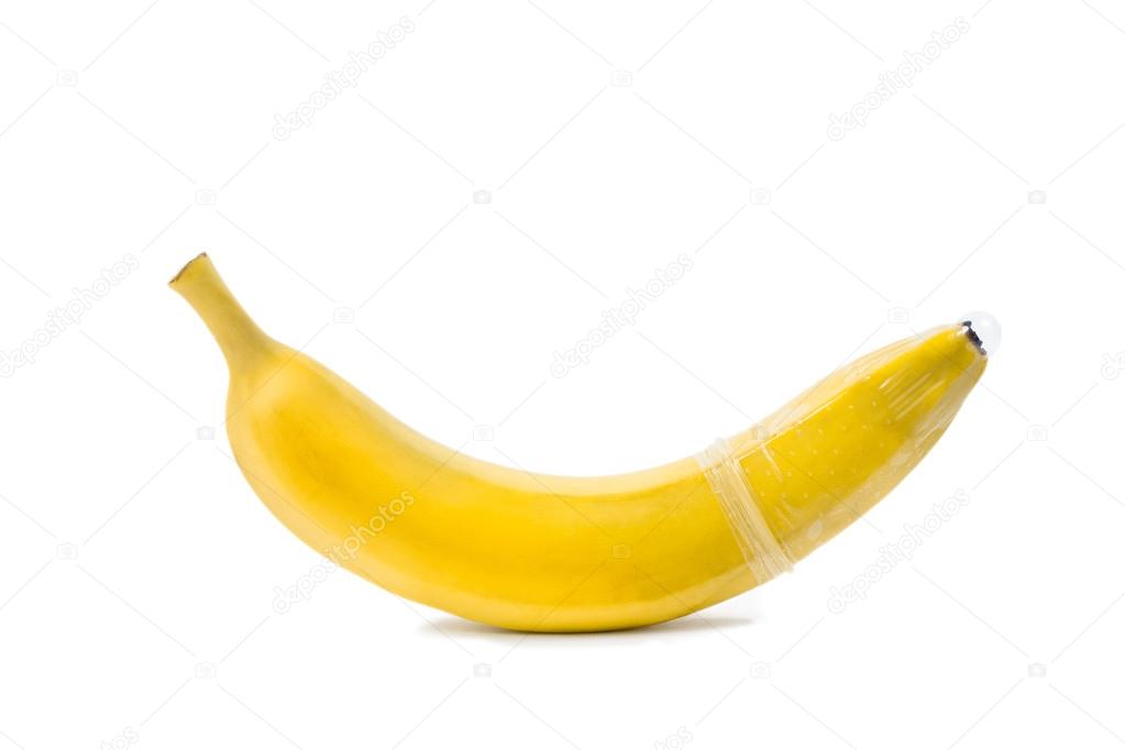 Isolated banana with condom