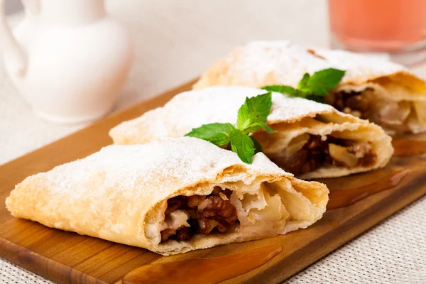 Strudel on the wooden board — Stock Photo, Image