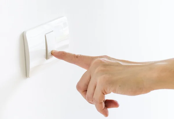 Finger press on light button — Stock Photo, Image