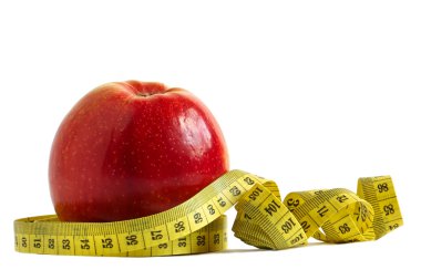 Kırmızı elma ve ölçü bandı