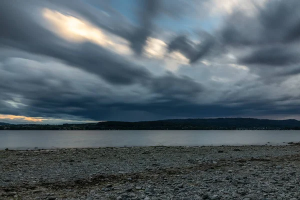 Storm moves over Lake Constance with powerful clouds in the sky