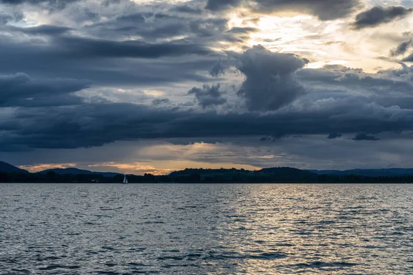 Storm moves over Lake Constance with powerful clouds in the sky