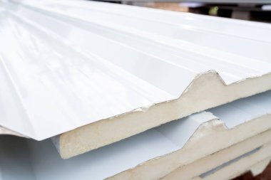 White PU foam roof sheet at the construction site. Install a new roof.