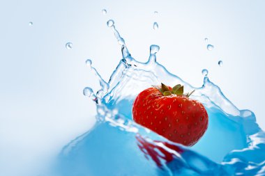 Strawberry falls deeply under water clipart