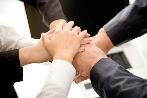 Hands on top of each other — Stock Photo, Image