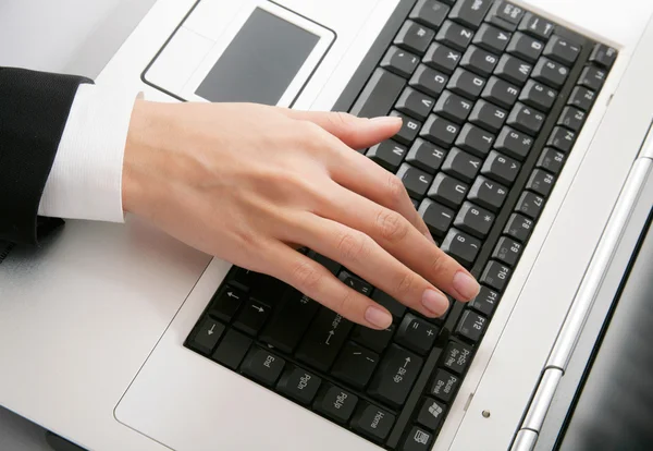 Hand over keyboard — Stock Photo, Image