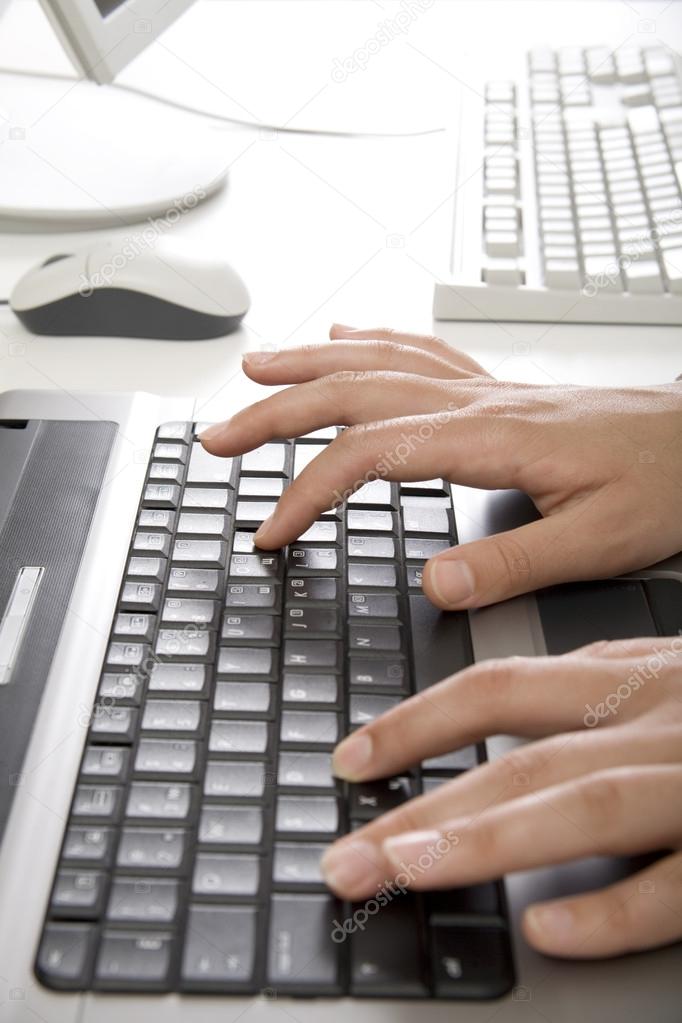 Hands over keyboard