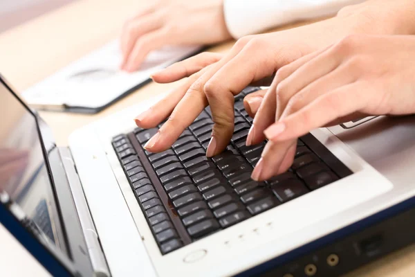 Human hands pressing keys — Stock Photo, Image