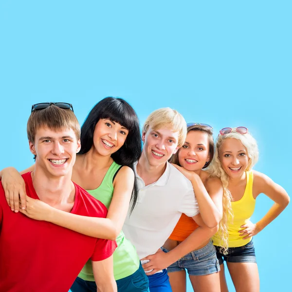 Adolescentes no fundo azul — Fotografia de Stock