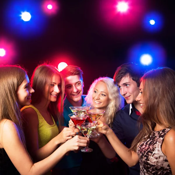 Friends clinking by glasses — Stock Photo, Image